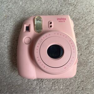 Pink Fujifilm Instax Mini 8 instant camera